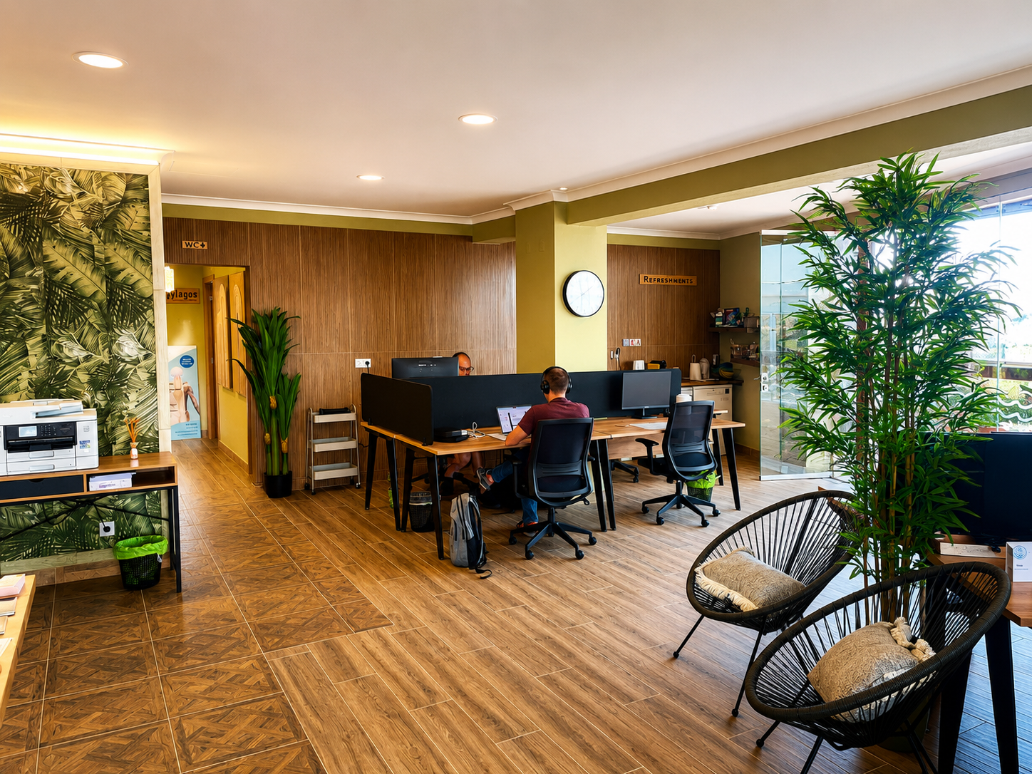 Open-plan coworking space in Lagos with members at desks